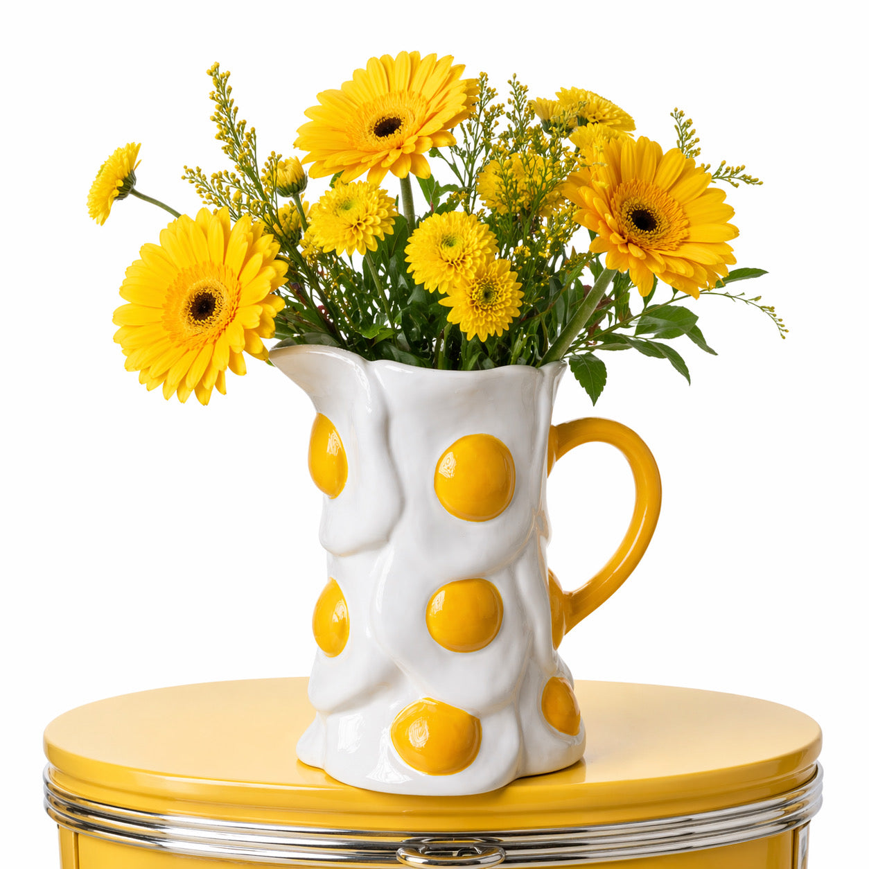 Egg Vase with yellow daisies on a diner table