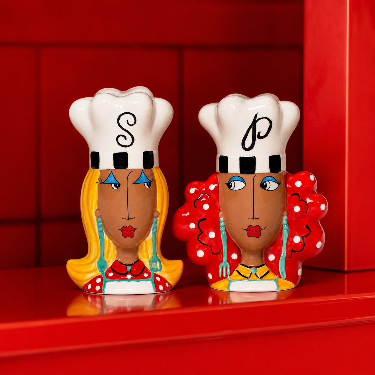Lola & Nola Bon Appetit on a red kitchen shelf
