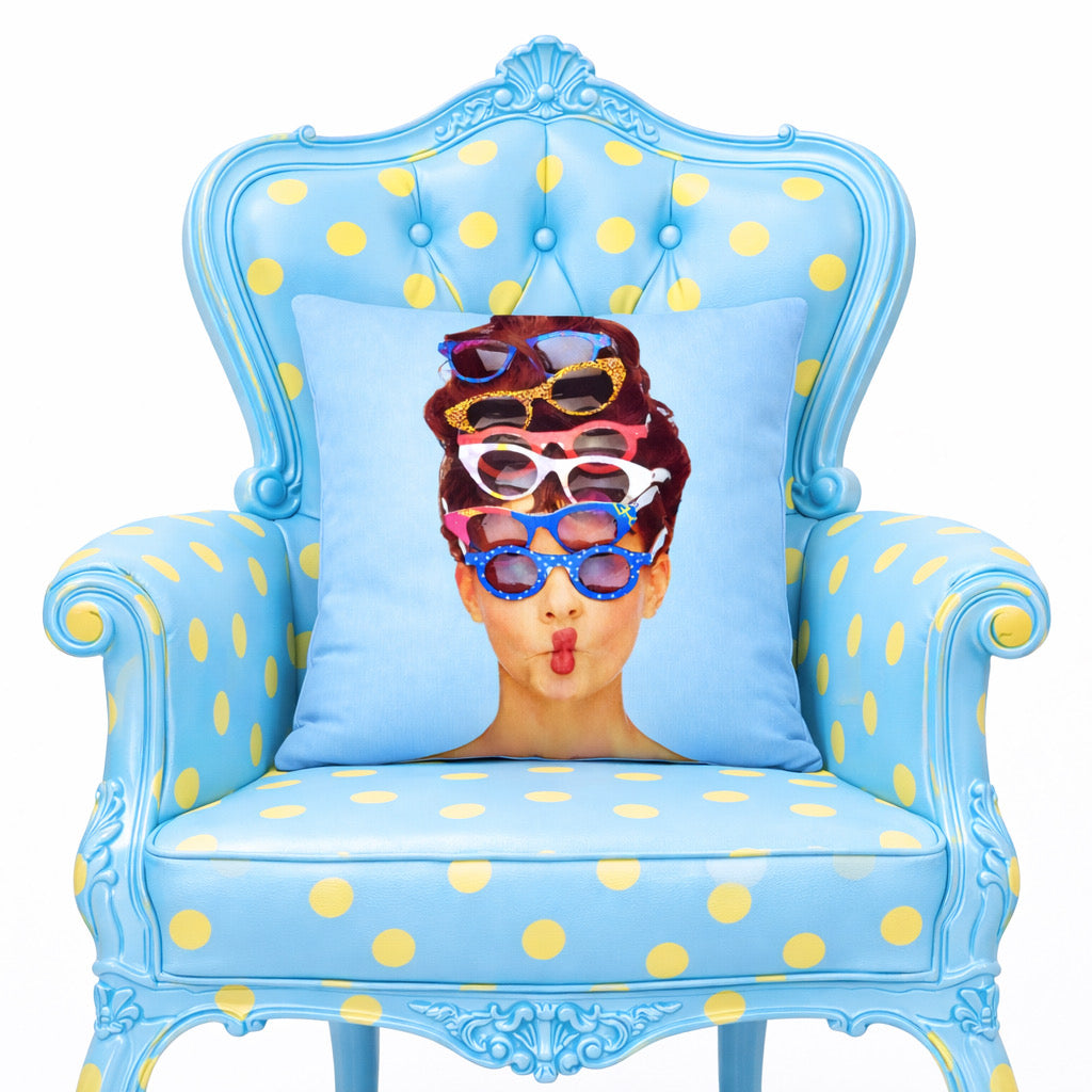Retro Shades cushion on a blue polka dot baroque armchair